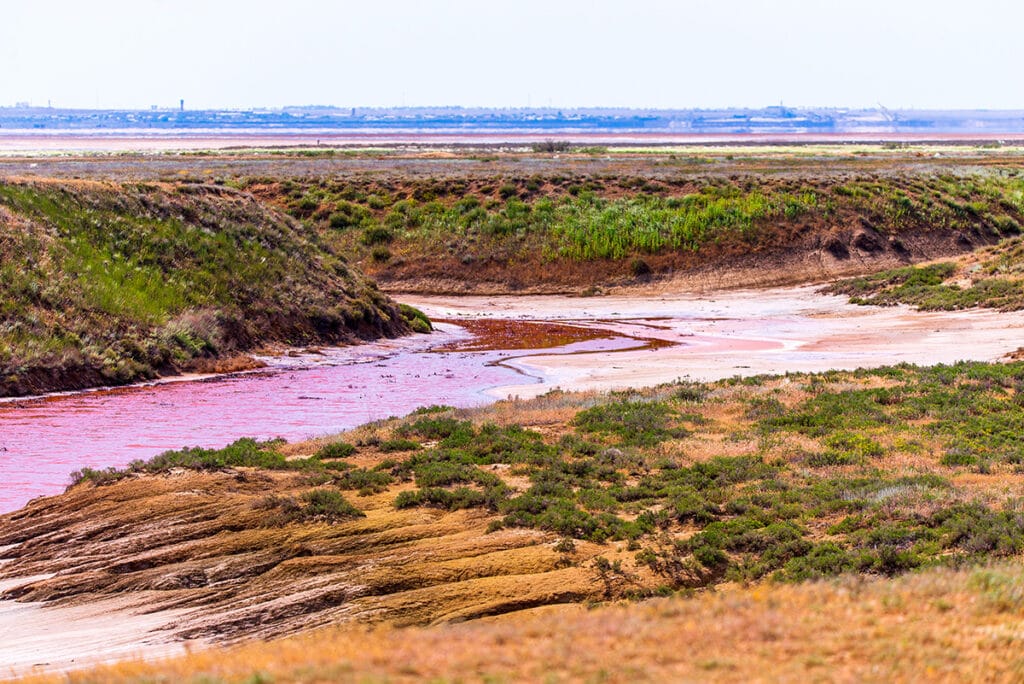 Eroding washout red with iron